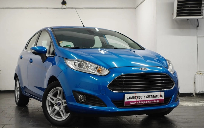 Ford Fiesta cena 26900 przebieg: 166556, rok produkcji 2013 z Wołów małe 781